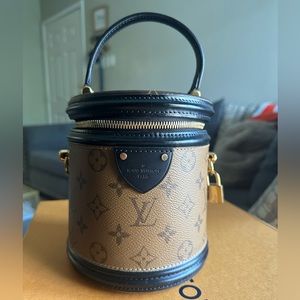 Louis Vuitton
Handbag Reverse Monogram Canvas - Authentic